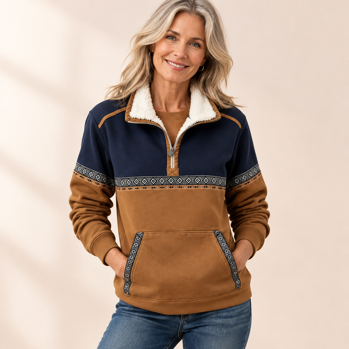 Woman wearing the Esme cosy half-zip jumper with warm sherpa collar