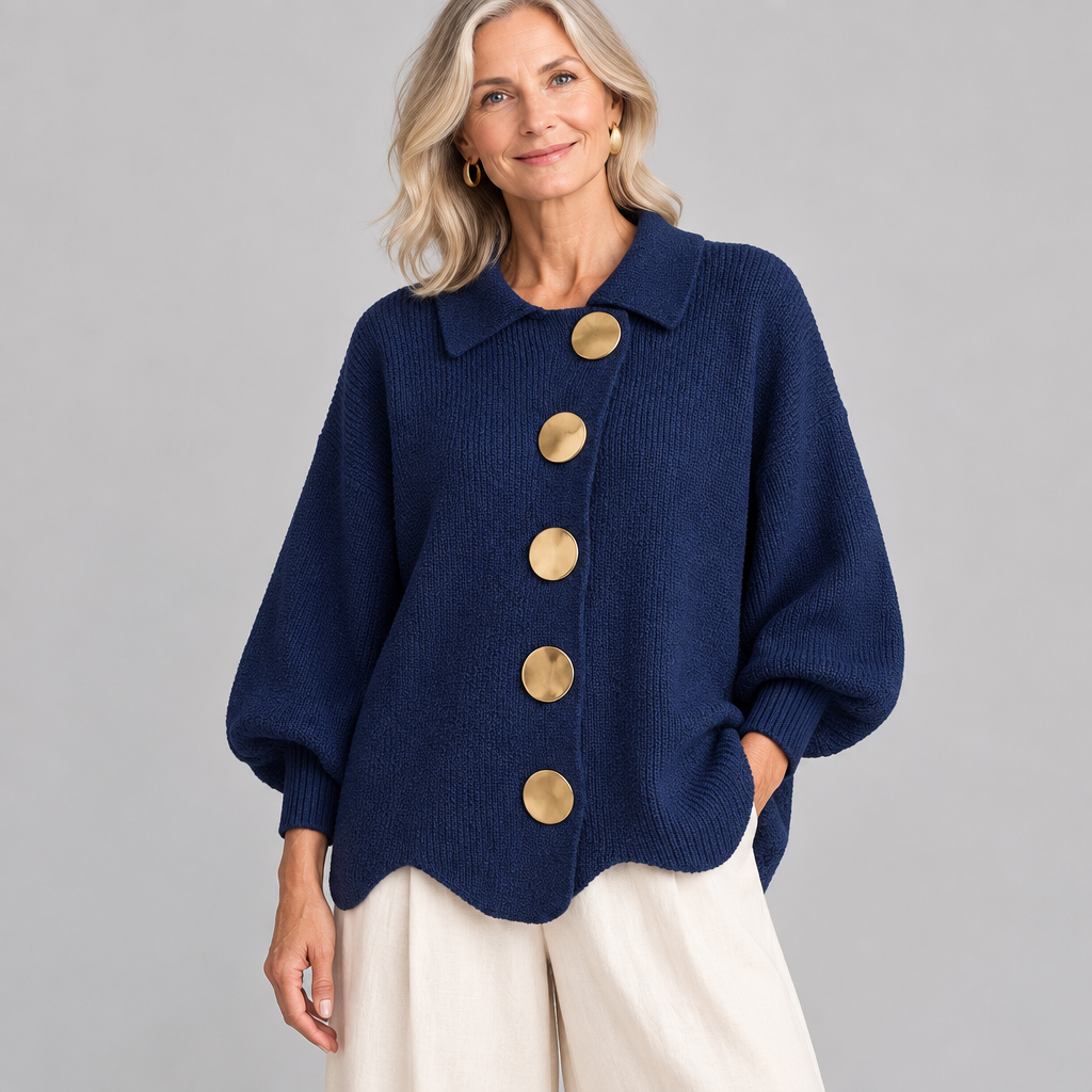 Woman wearing the Iolanthe warm chunky knit cardigan with collar and large metal buttons
