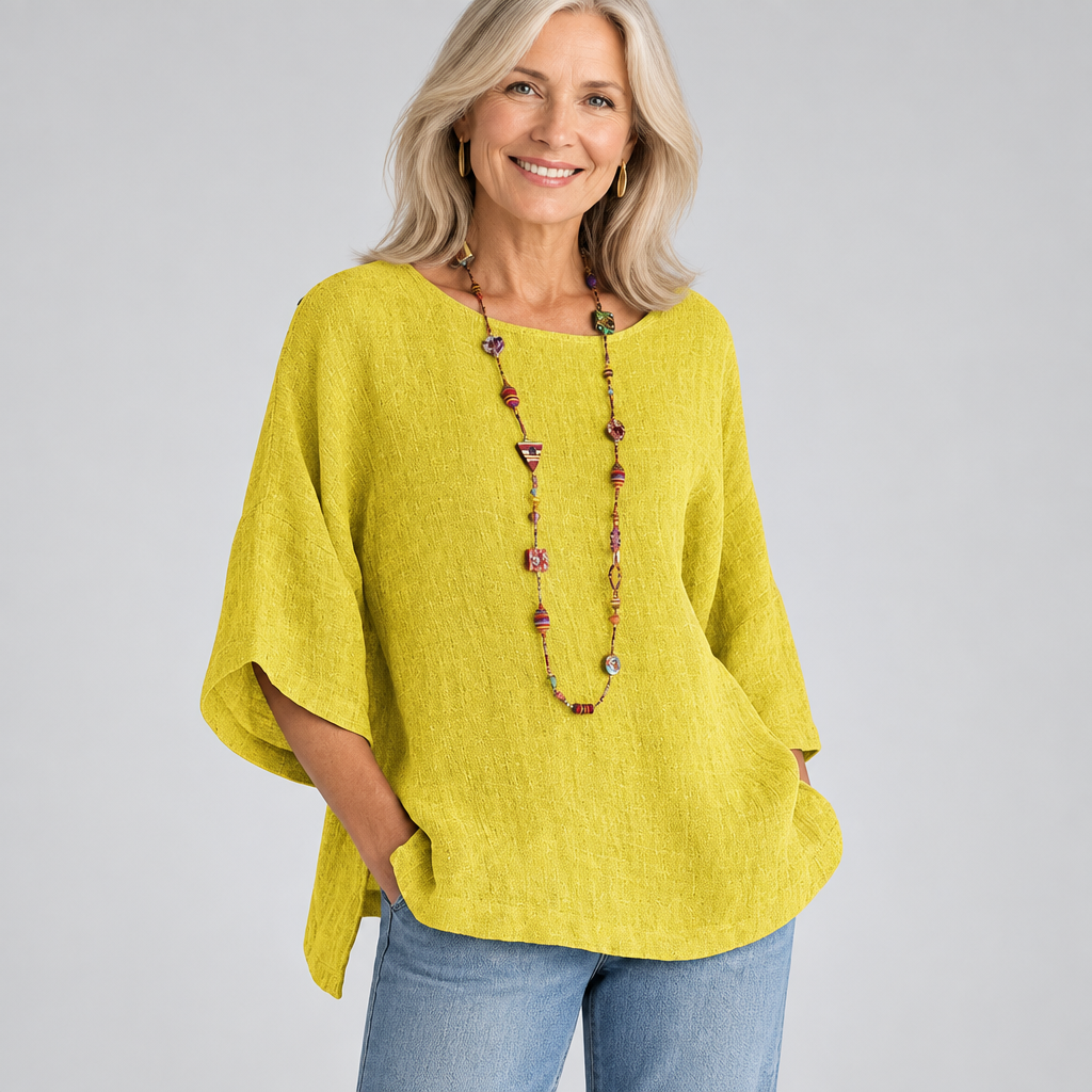 Woman wearing the Sophie relaxed lightweight top with jeans