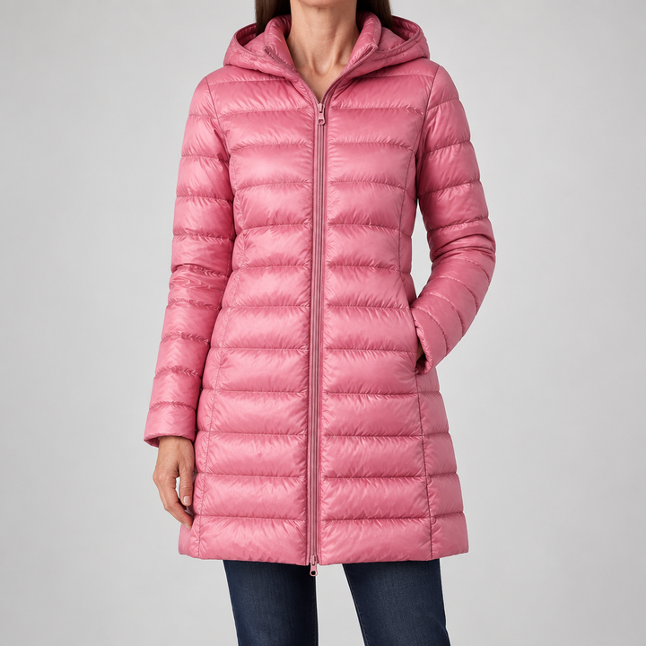 Woman wearing the Feathra ultralight down jacket in pink