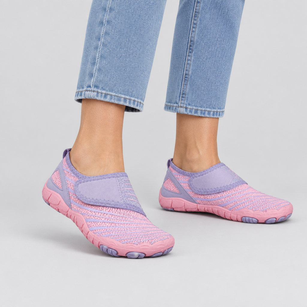 Woman wearing the Mira barefoot trainers with wide toe box