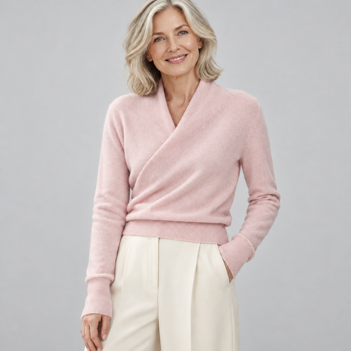 Woman wearing the Isla soft crossover shawl-neck jumper
